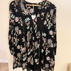 NWT Free people black floral embroidered with cute cut out hi lo top